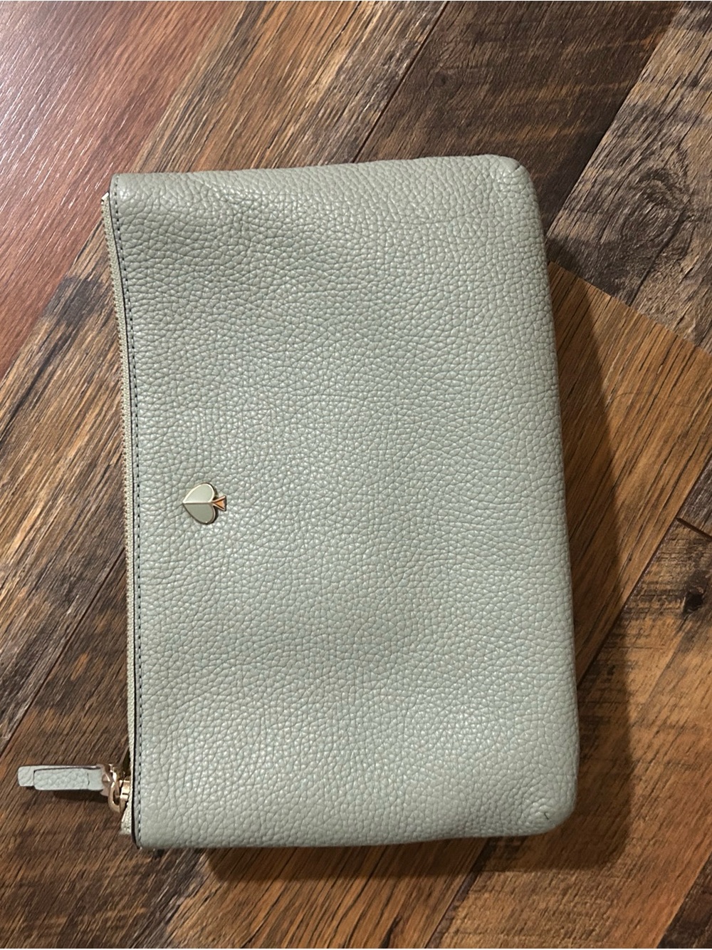 kate spade pebbled leather crossbody pouch in sage green with gold-tone logo